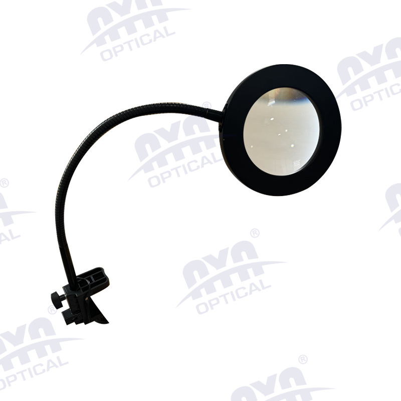 Auxiliary clamp table lamp magnifier
